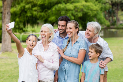 Multi-generation family taking a selfie on a mobile phone