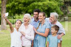 Multi-generation family taking a selfie on a mobile phone