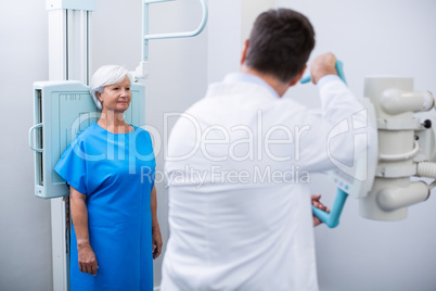 Senior woman undergoing an x-ray test