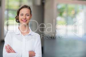 Beautiful and confident businesswoman with arms crossed