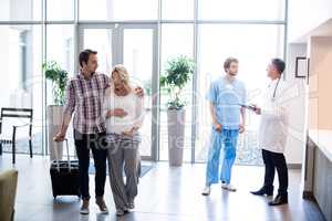 Couple interacting with each other in hospital