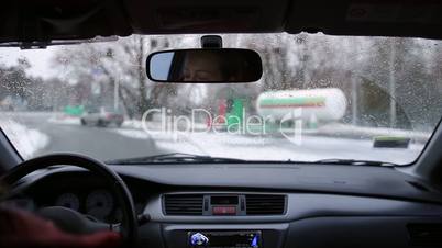 Driving car to fuel at gas station