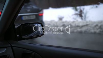 Side rear-view mirror of a modern car