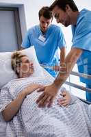 Doctors examining pregnant woman