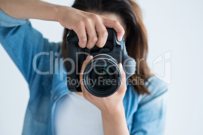 Female photographer with digital camera