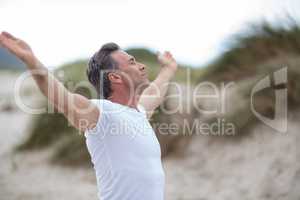 Mature man doing meditation