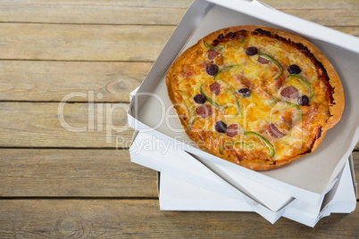 Italian pizza served in a opened box