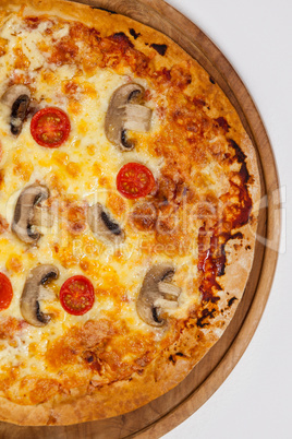 Delicious italian pizza served on pizza tray