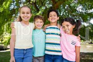 Portrait of happy kids in park