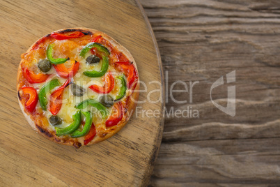 Italian pizza on a wooden tray