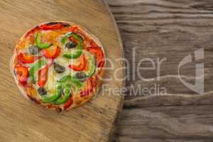 Italian pizza on a wooden tray