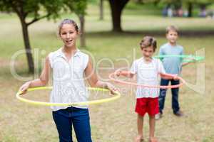 Kids playing with hula hoop