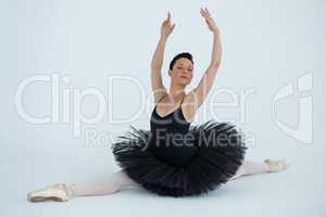 Ballerina performing a split