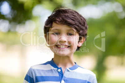 Portrait of boy smiling in park