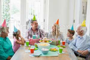 Happy multi- generation family celebrating a birthday