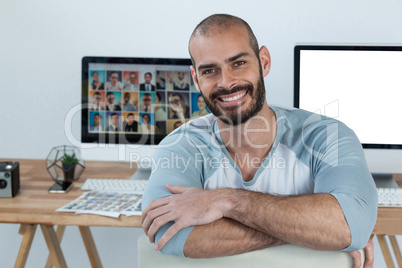 Portrait of photographer smiling at camera