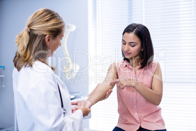 Doctor examining patient