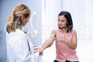 Doctor examining patient