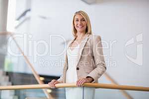 Beautiful businesswoman standing in conference centre