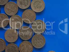 One Pound (GBP) coin, United Kingdom (UK) over blue with copy sp