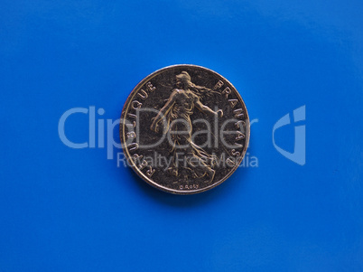 Half franc coin, France over blue