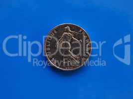 Half franc coin, France over blue