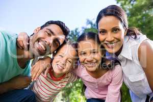 Portrait of smiling family in park