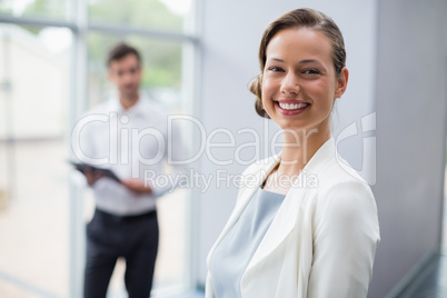 Cheerful businesswoman at conference centre