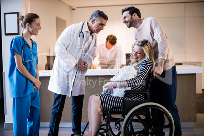 Doctors and patient interacting with each other