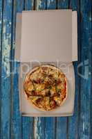 Delicious pizza in pizza box