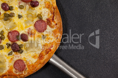 Delicious italian pizza served on pizza peel