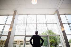 Businessman standing in conference centre