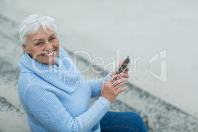 Senior woman using mobile phone