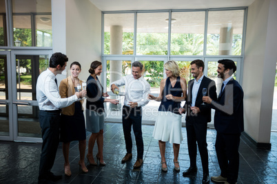 Business executives celebrating at conference center