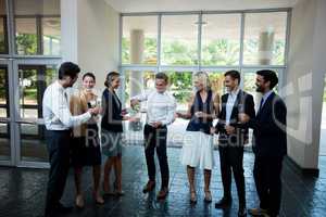 Business executives celebrating at conference center