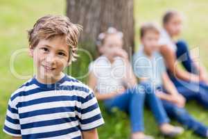 Boy smiling in park