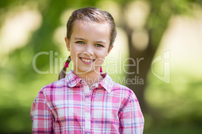 Portrait of a girl smiling in park