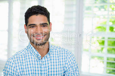 Portrait of man in living room