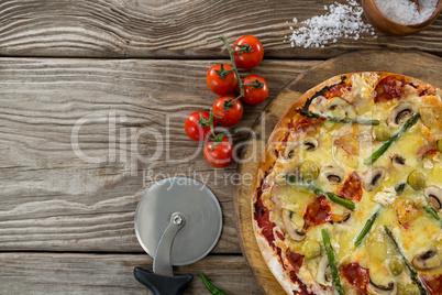 Various species with pizza arranged on a wooden tray