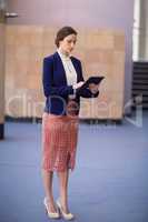 Businesswoman using digital tablet