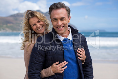 Mature couple enjoying on the beach