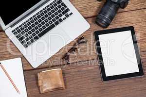 Close-up of laptop with camera on table