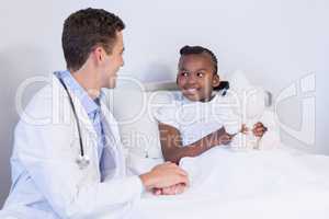 Doctor talking to a girl patient