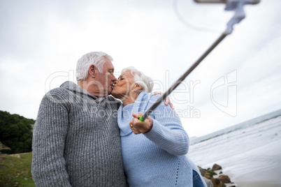 Senior couple taking a selfie from selfie stick