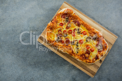 Italian pizza served on a chopping board