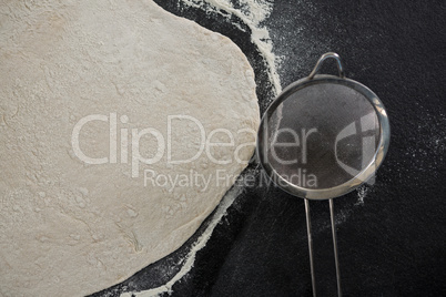 Pizza dough with tea strainer