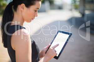 Businesswoman using digital tablet