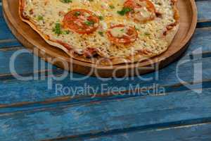 Delicious italian pizza served on pizza tray