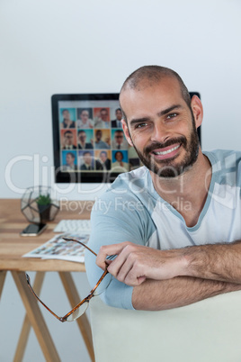 Portrait of photographer smiling at camera