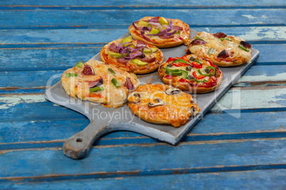 Various delicious italian pizza served on pizza tray